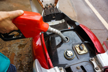 The oil must be added to the fuel tank to fill up to continue.