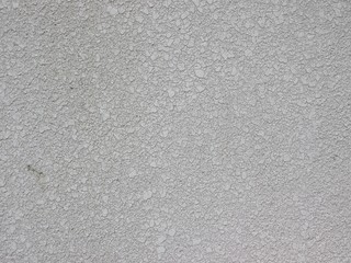 Fototapeta na wymiar 吹き付け塗装されたモルタルの壁