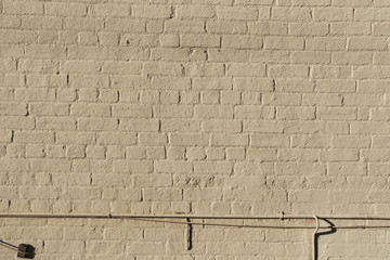 Yellow painted brick wall