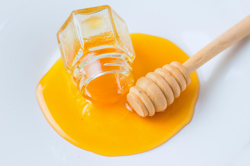Honey spilled on a plate