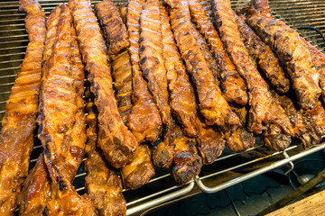 Grilled ribs in Thailand walking street market.