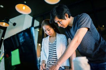 asian couple working at home