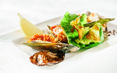 mussels baked with parmesan and herbs