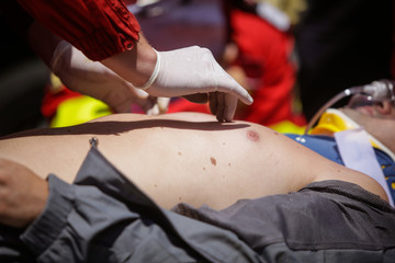 Paramedics rescue the victim of a drill car crash