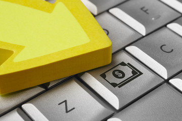 Money icon on a computer keyboard. Finance e-commerce