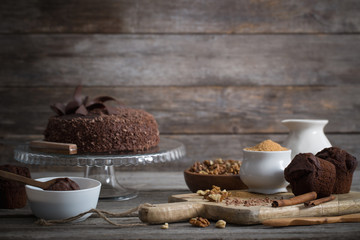 Chocolate cake on old wooden table