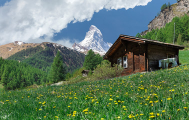 Fototapeta premium Matterhorn mountain in the background of clouds