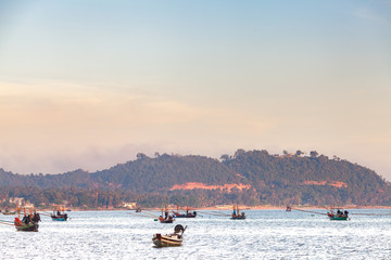 Boat drive in the sea with mountain on background