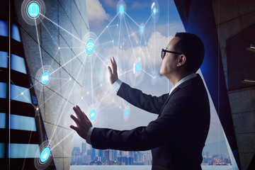 Smart businessman using the modern technologies interface . Business , transportation and wireless communication network reality concept .