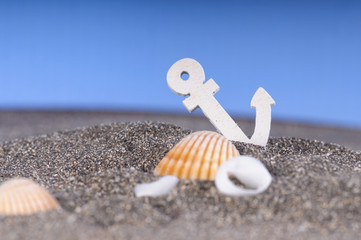 Obraz premium Anchor in the sand at the bottom. Marine background