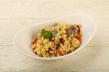 Bulgur with chicken hearts
