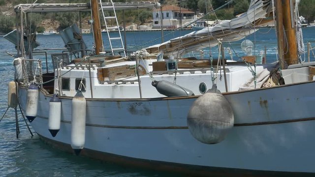 Vintage old wood yacht in the port.