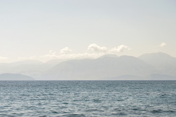 sea in the morning, mountain landscape background
