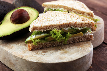 sliced avocado on toast bread with spices and avocado
