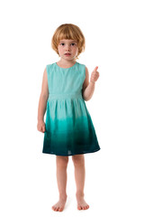 Cute little girl standing and showing thumbs up.Isolated