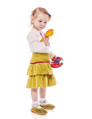Girl playing rattle