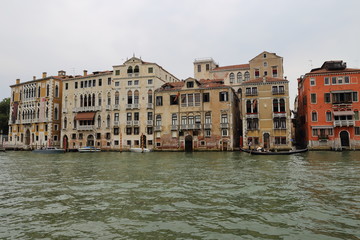 colorful houses and canal in Venice, Italy