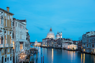 Grand Canal in Venice with Santa Maria della Salute in the background at night, Italy