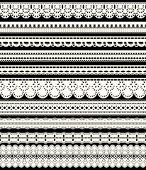 Set of seamless lace borders. Ten white openwork ribbons isolated on black background.