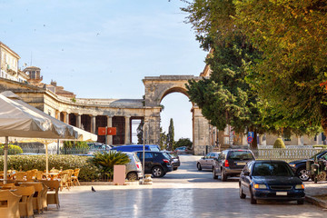 Fototapeta na wymiar Streets of Corfu island with old ancient arch. Greece, daylight view