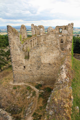 Fototapeta na wymiar Main building of old castle ruin Helfenburk from tower view. Czech landscape