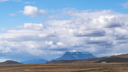 farm house with Her&eth;ubrei&eth; mountain in the distance