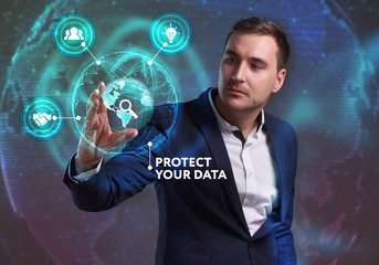 Business, Technology, Internet and network concept. Young businessman working on a virtual screen of the future and sees the inscription: Protect your data
