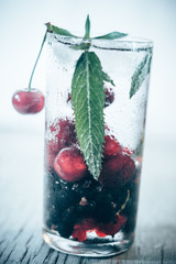 Summer cooling drink with fruit and ice.