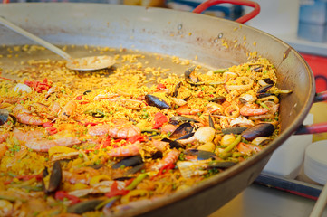 STraditional Spanish paella with seafood and chicken.
