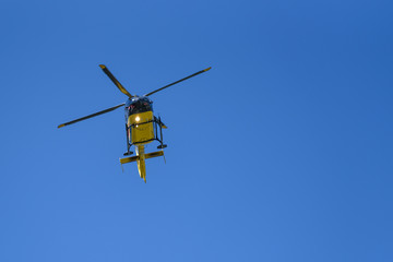 Fototapeta na wymiar Generic yellow helicopter