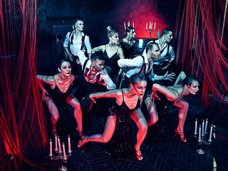 The studio shot of group of retro dancers