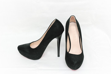 Women's shoes are black.
