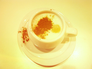 Cup of coffee cappuccino with cinnamon