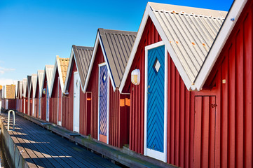 Fishing lodges on the beach in sunny weather