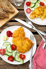 Homemade chicken nuggets with cheese and bread crumbs