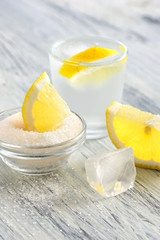 Lemon with sugar. Lemonade cold with ice and lemon.