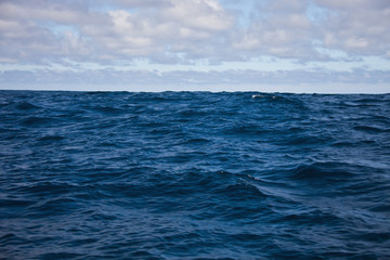 Fototapeta premium Waves of the Atlantic ocean and morning sky with clouds
