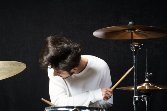 the drummer behind the drums