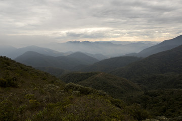 serra fina mountain range with clouds in the winter of minas gerais brazil horizontal