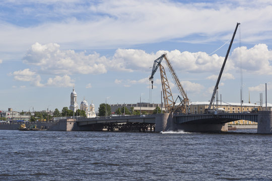 View of the renovated Tuchkov Bridge from the Makarova Embankment in St. Petersburg, Russia