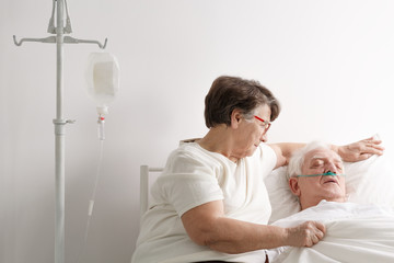 Woman taking care of sick husband