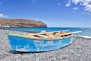 Fototapeta na wymiar Rowing boat on the beach