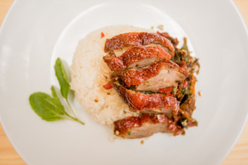 stir-fried roasted duck and basil and fried egg with rice, Thai food