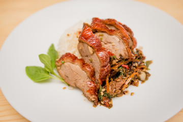 stir-fried roasted duck and basil and fried egg with rice, Thai food