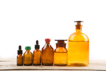Different vintage pharmacy bottles isolated on white