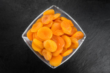 Rustic slate slab with Apricots (dried) (selective focus)