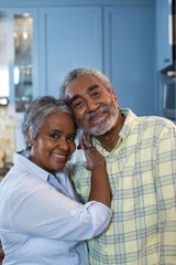 Close up portrait of smiling senior couple © wavebreak3