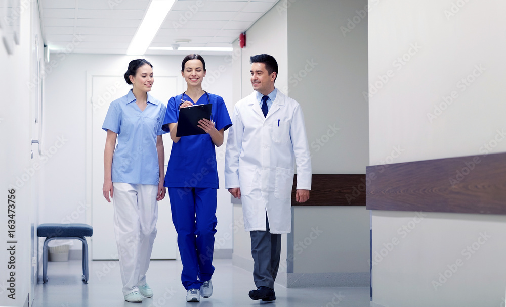 Sticker group of smiling medics at hospital with clipboard