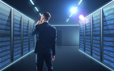 businessman over server room background