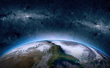 Earth in the space. Stars on the background. Place for text and infographics. Elements of this image furnished by NASA.